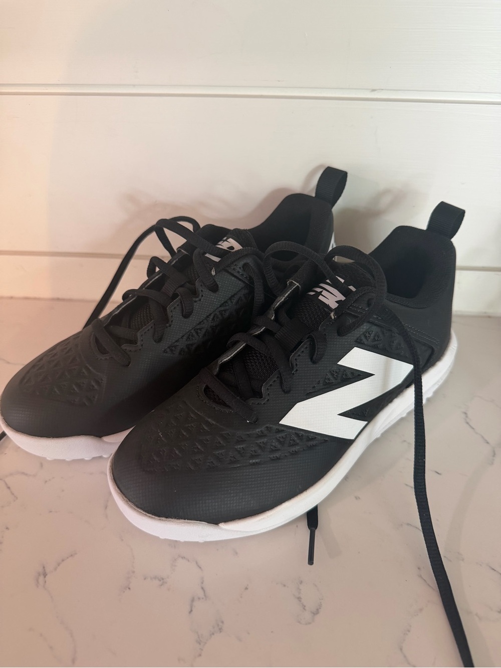 New Balance Kids Black Sneakers with White 'N' Logo